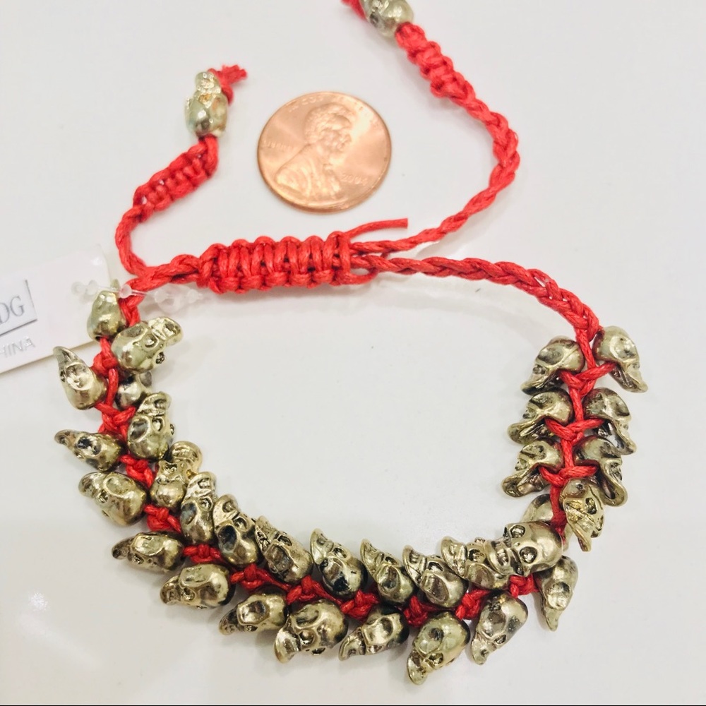 NWT bracelet, multiple bronze skulls & red thread - Picture 3 of 8